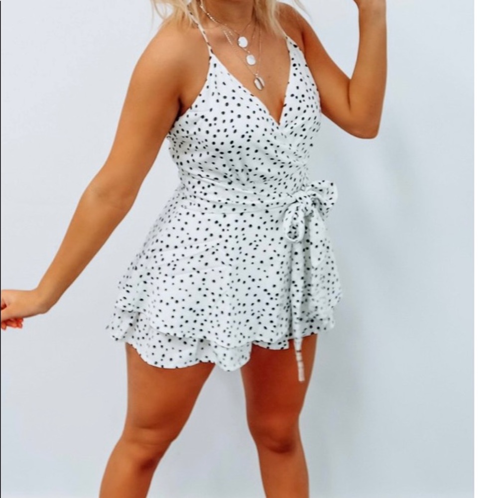 Black and white polka dot wrap tie romper